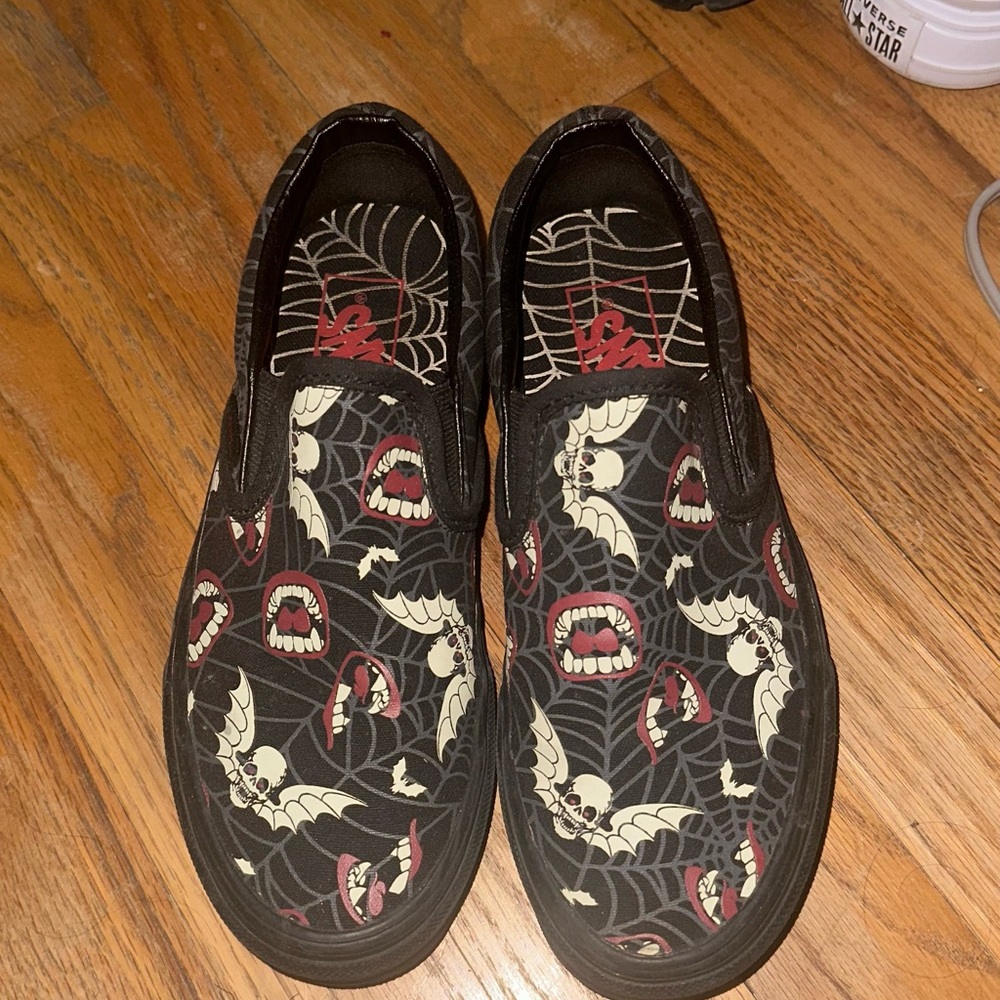 Vans Black Slip-On Loafers with Cream Bat & Red Mouth Graphics